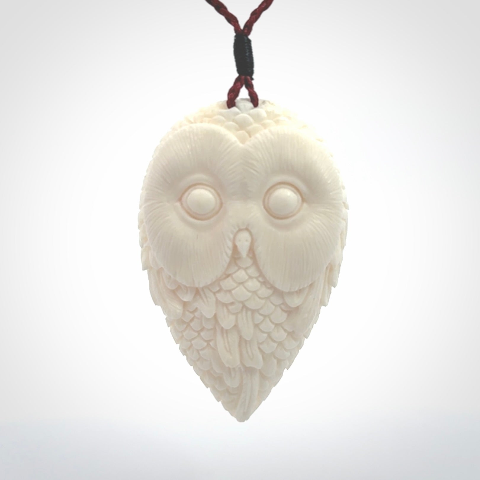 A Owl design carving, hand made for us from Bone. This pendant is provided with an adjustable cord.