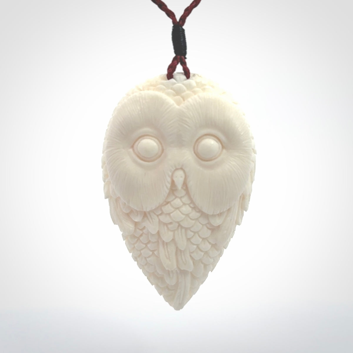 A Owl design carving, hand made for us from Bone. This pendant is provided with an adjustable cord.
