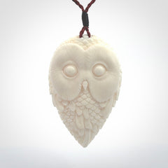 A Owl design carving, hand made for us from Bone. This pendant is provided with an adjustable cord.