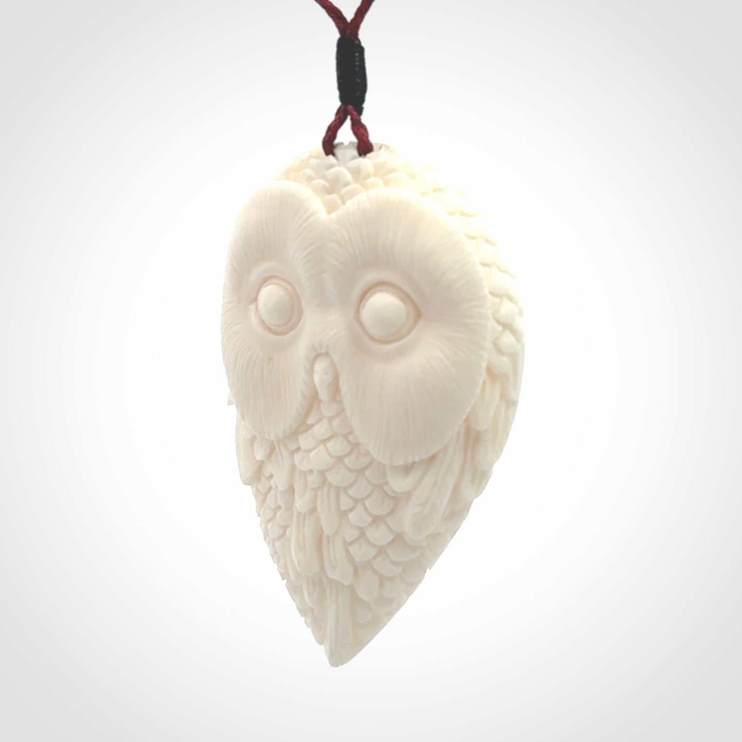 A Owl design carving, hand made for us from Bone. This pendant is provided with an adjustable cord.