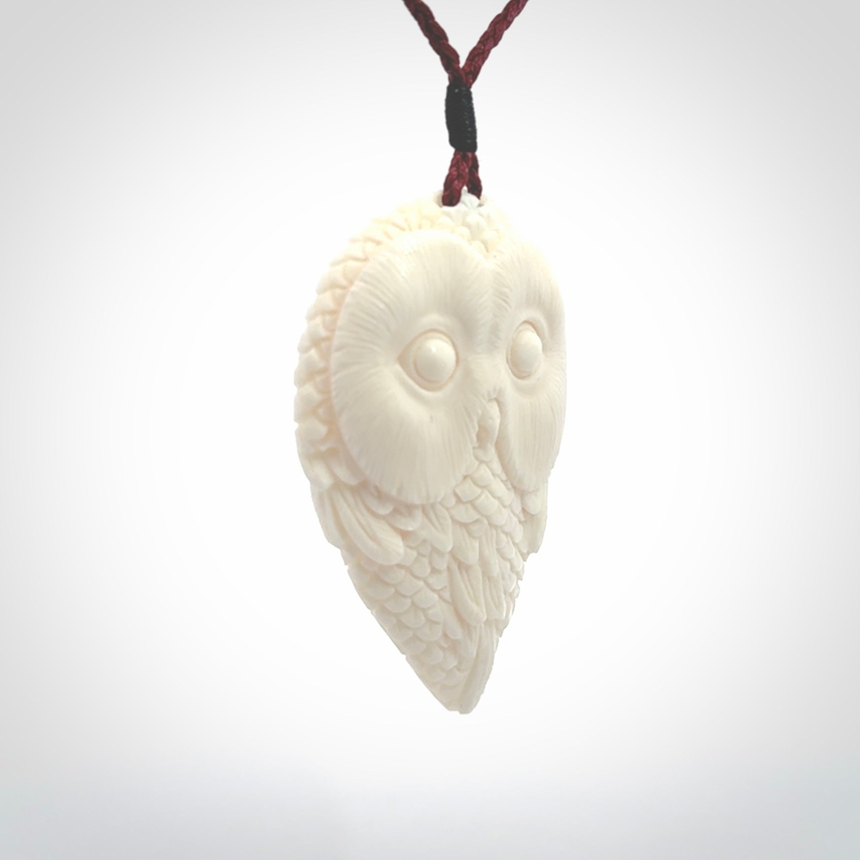 A Owl design carving, hand made for us from Bone. This pendant is provided with an adjustable cord.