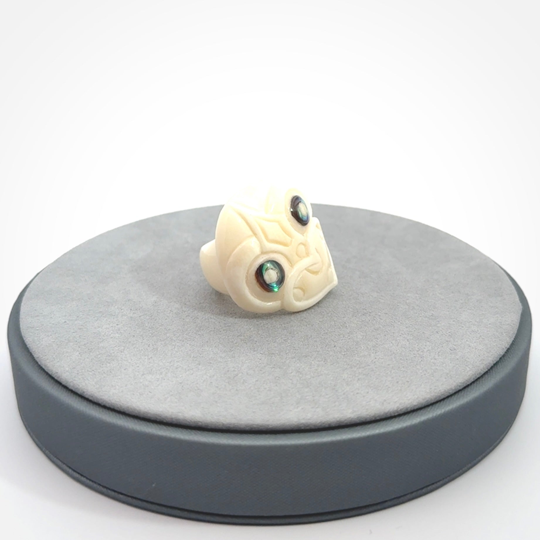 Hand carved bone tiki ring