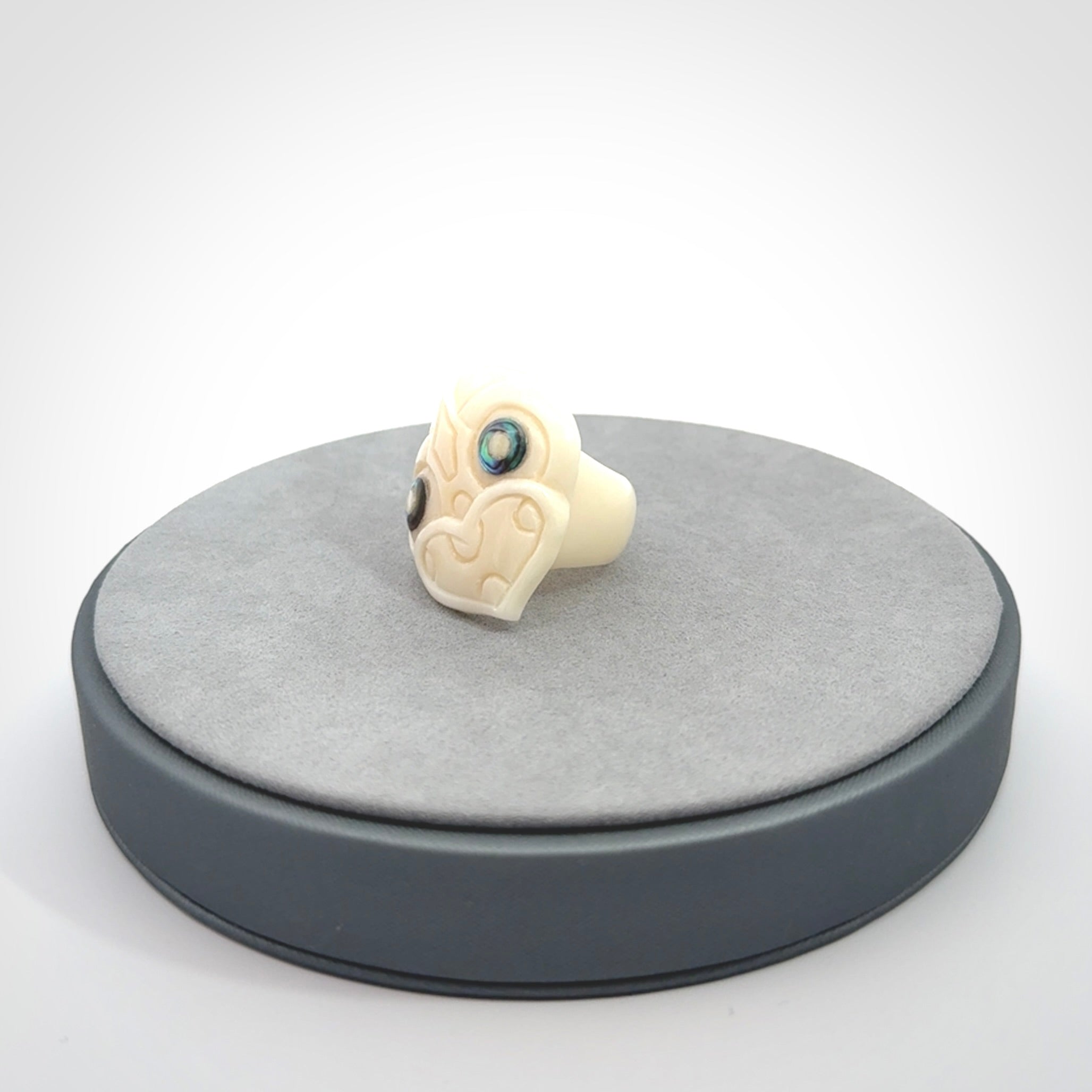 Hand carved bone tiki ring