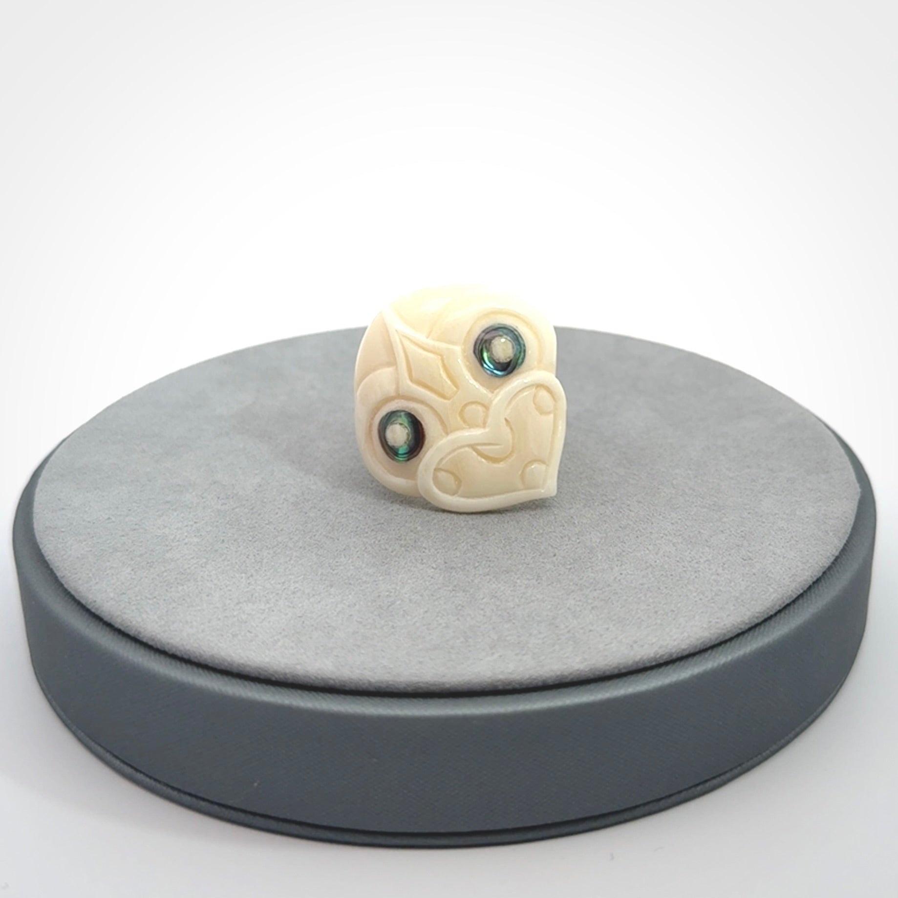 Hand carved bone tiki ring