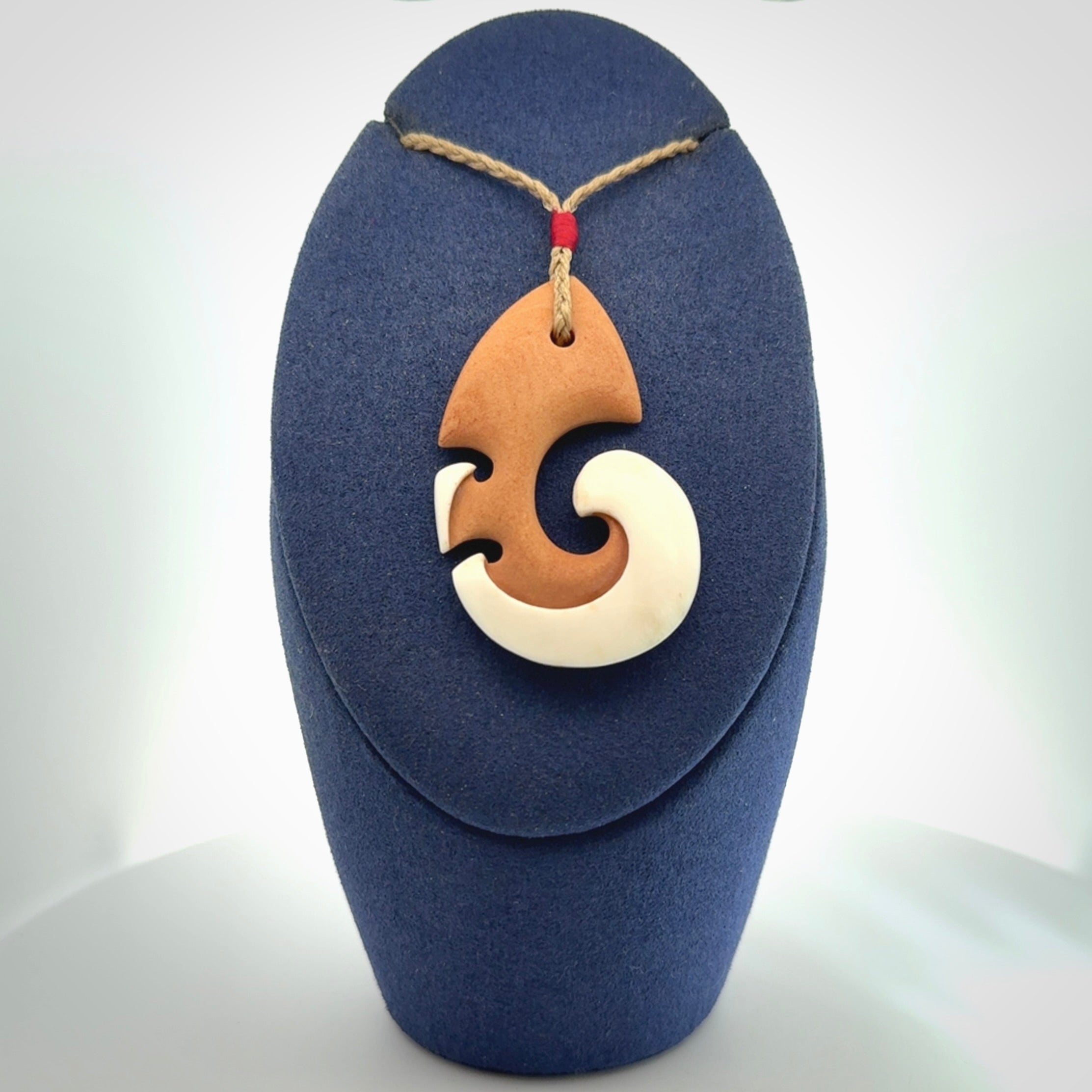 Beautifully Balanced and Detailed koru pendant, carved in bone
