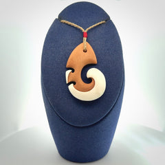 Beautifully Balanced and Detailed koru pendant, carved in bone