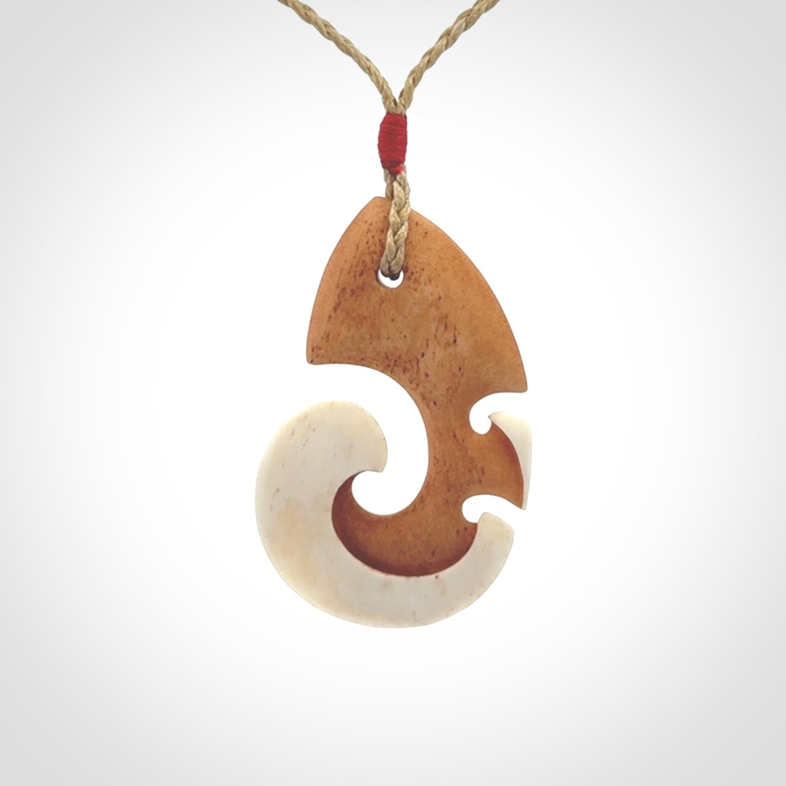 Beautifully Balanced and Detailed koru pendant, carved in bone