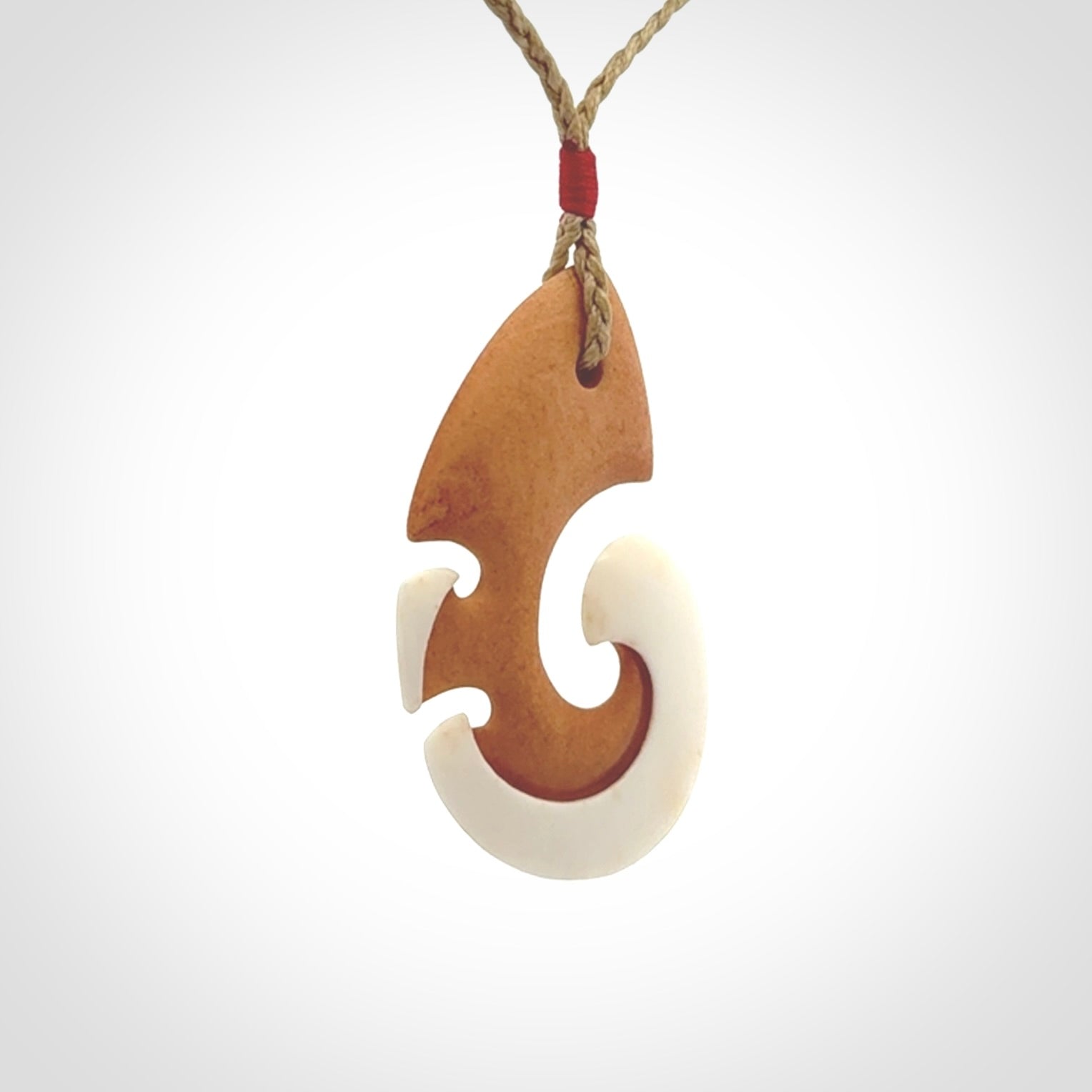 Beautifully Balanced and Detailed koru pendant, carved in bone