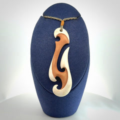 Hand carved bone hook pendant