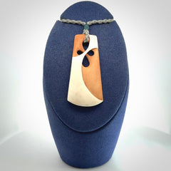 Hand carved bone path of life toki pendant