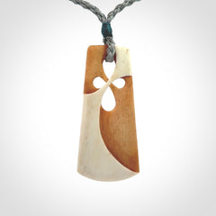 Hand carved bone path of life toki pendant