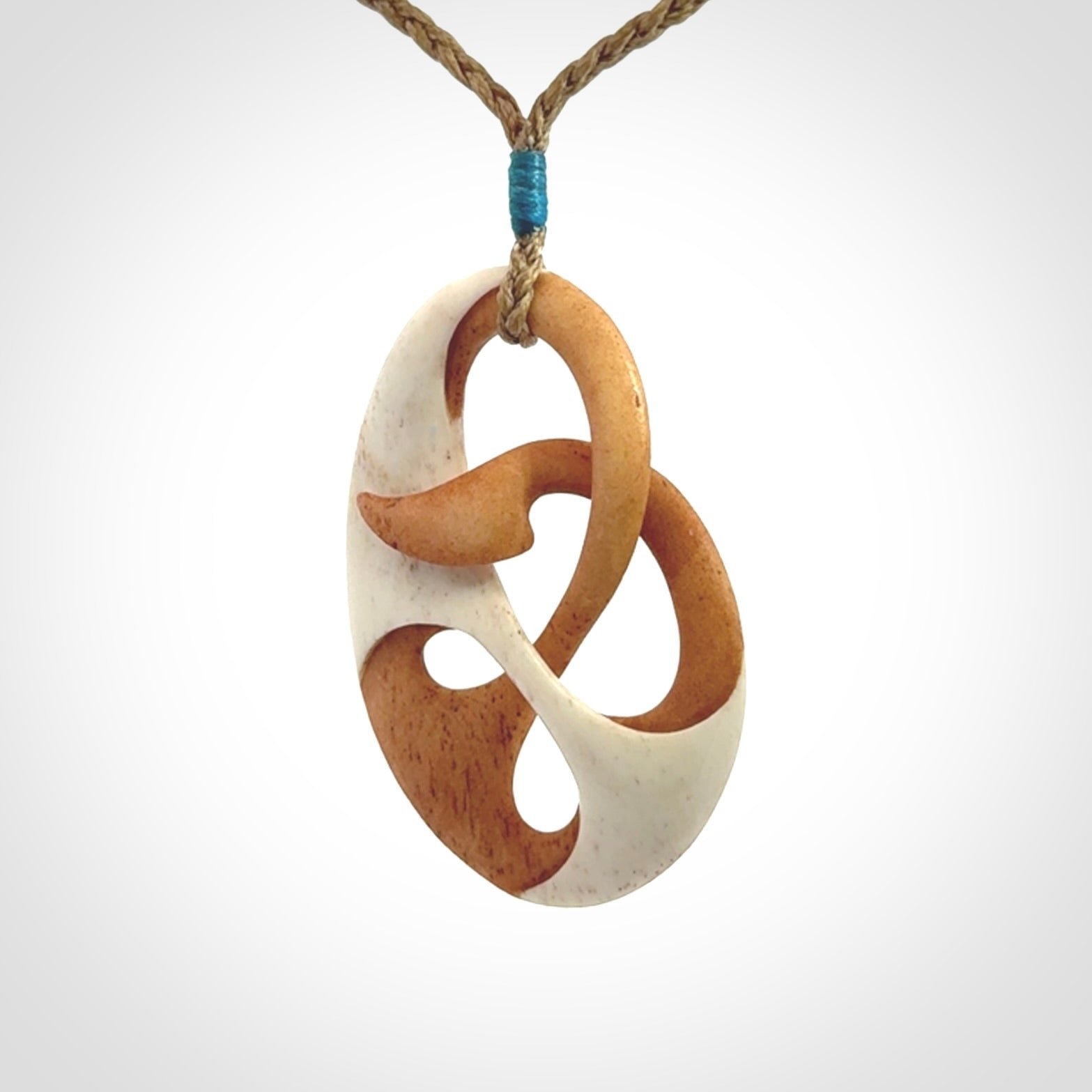 Hand carved bone path of life hook pendant