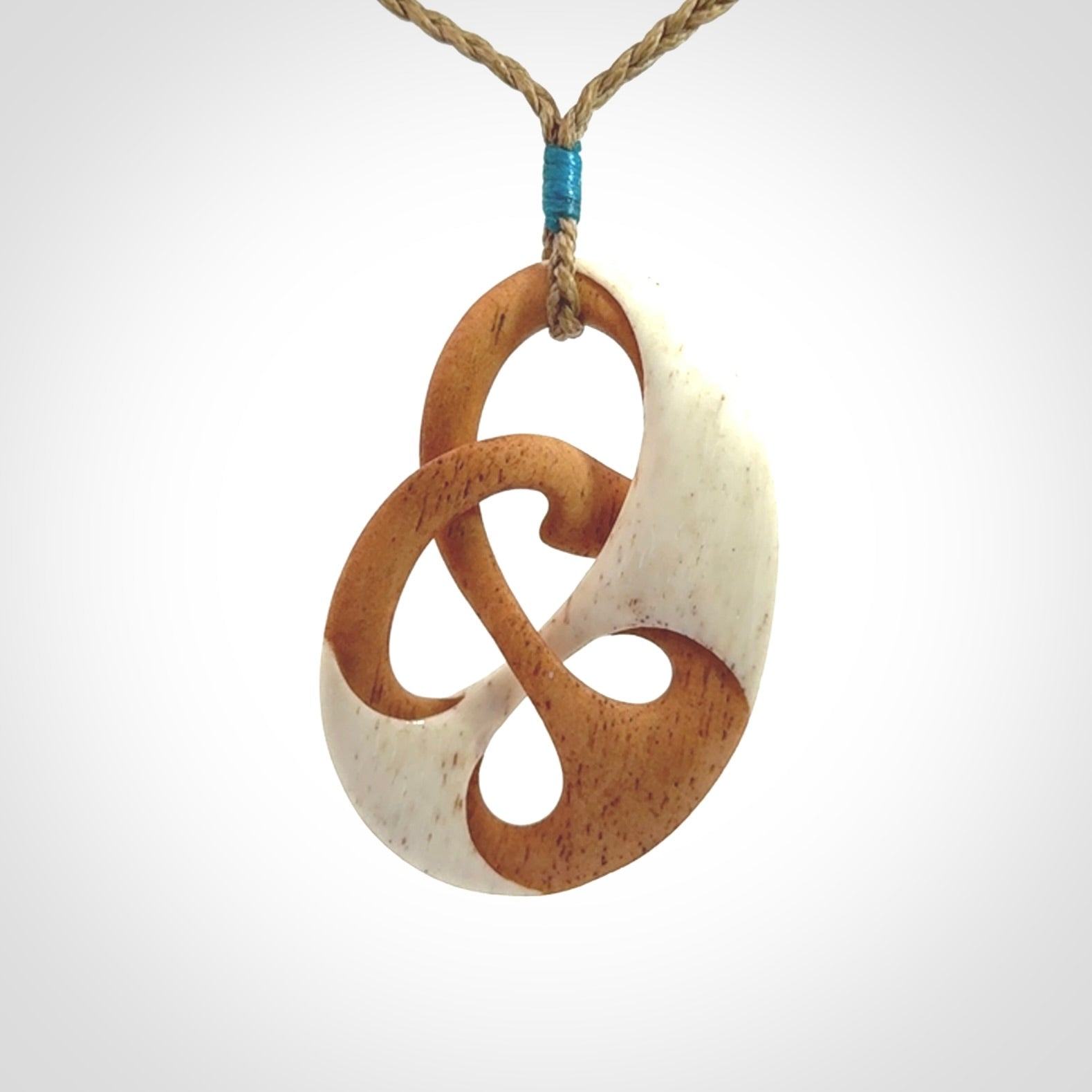 Hand carved bone path of life hook pendant