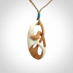 Hand carved bone path of life hook pendant