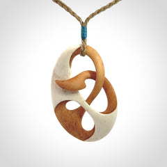 Hand carved bone path of life hook pendant