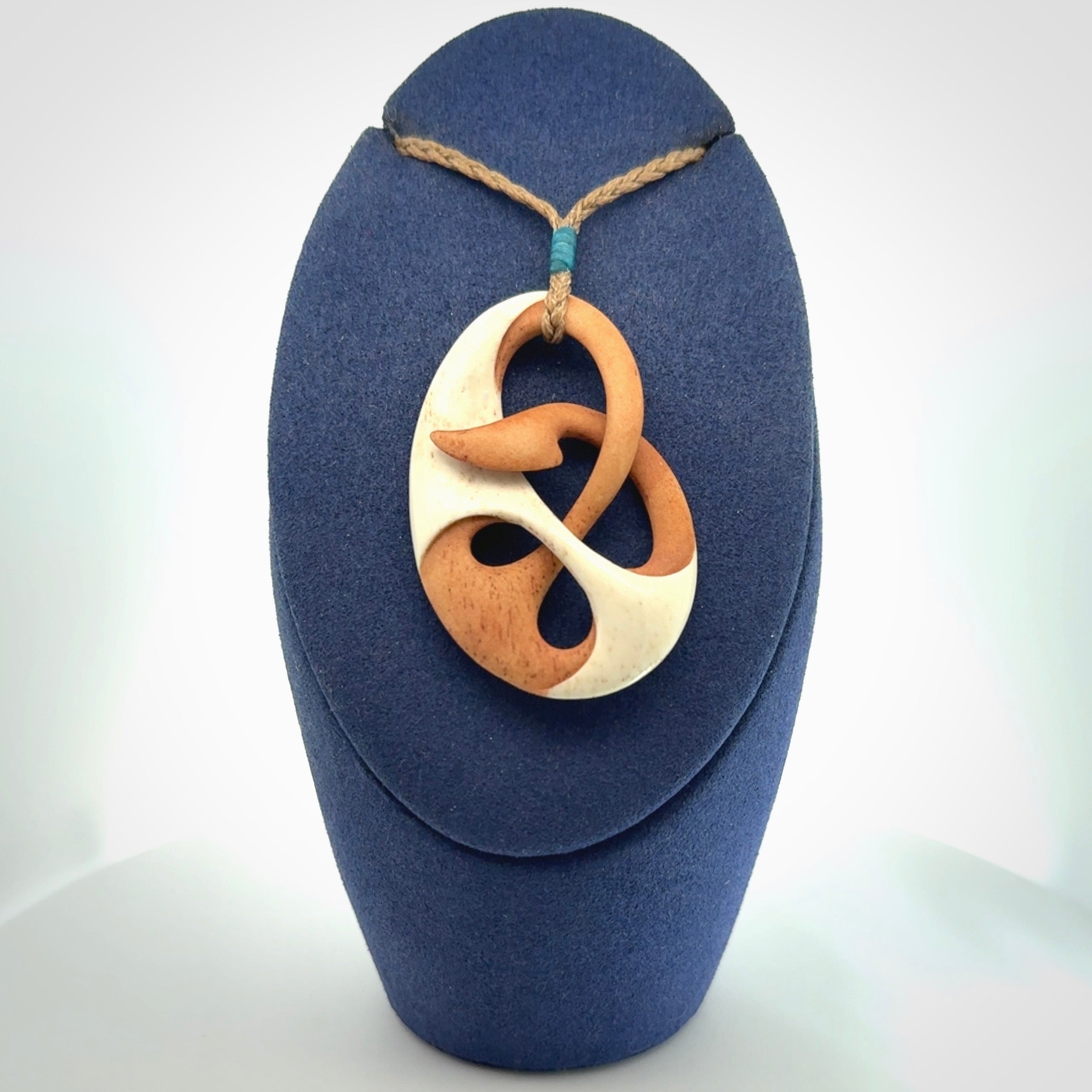 Hand carved bone path of life hook pendant