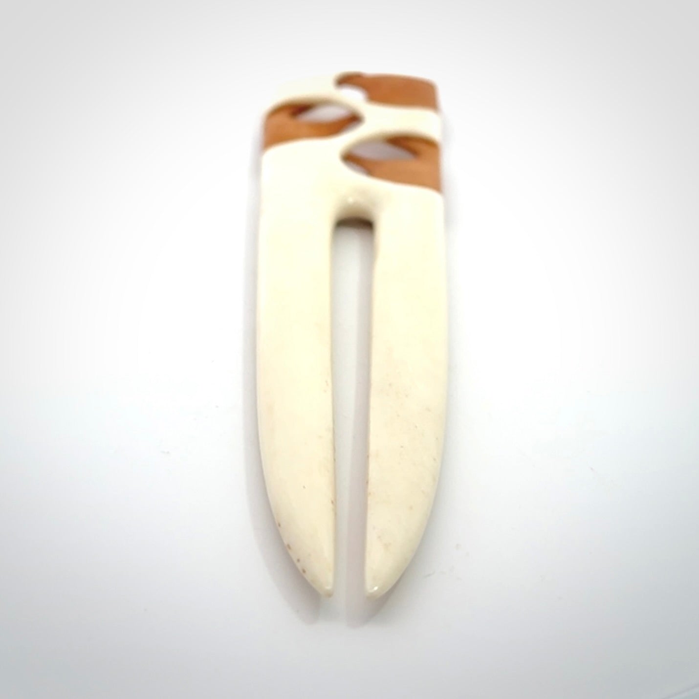 Hand carved bone heru comb