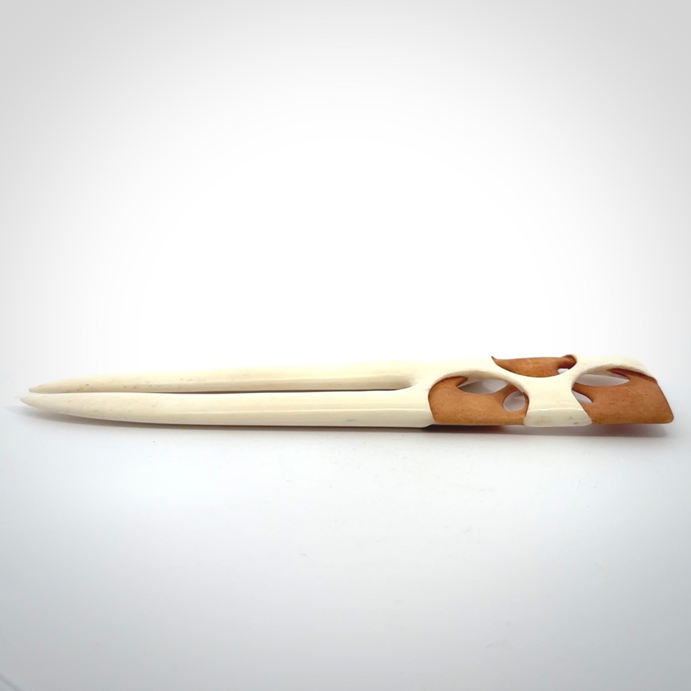 Hand carved bone heru comb