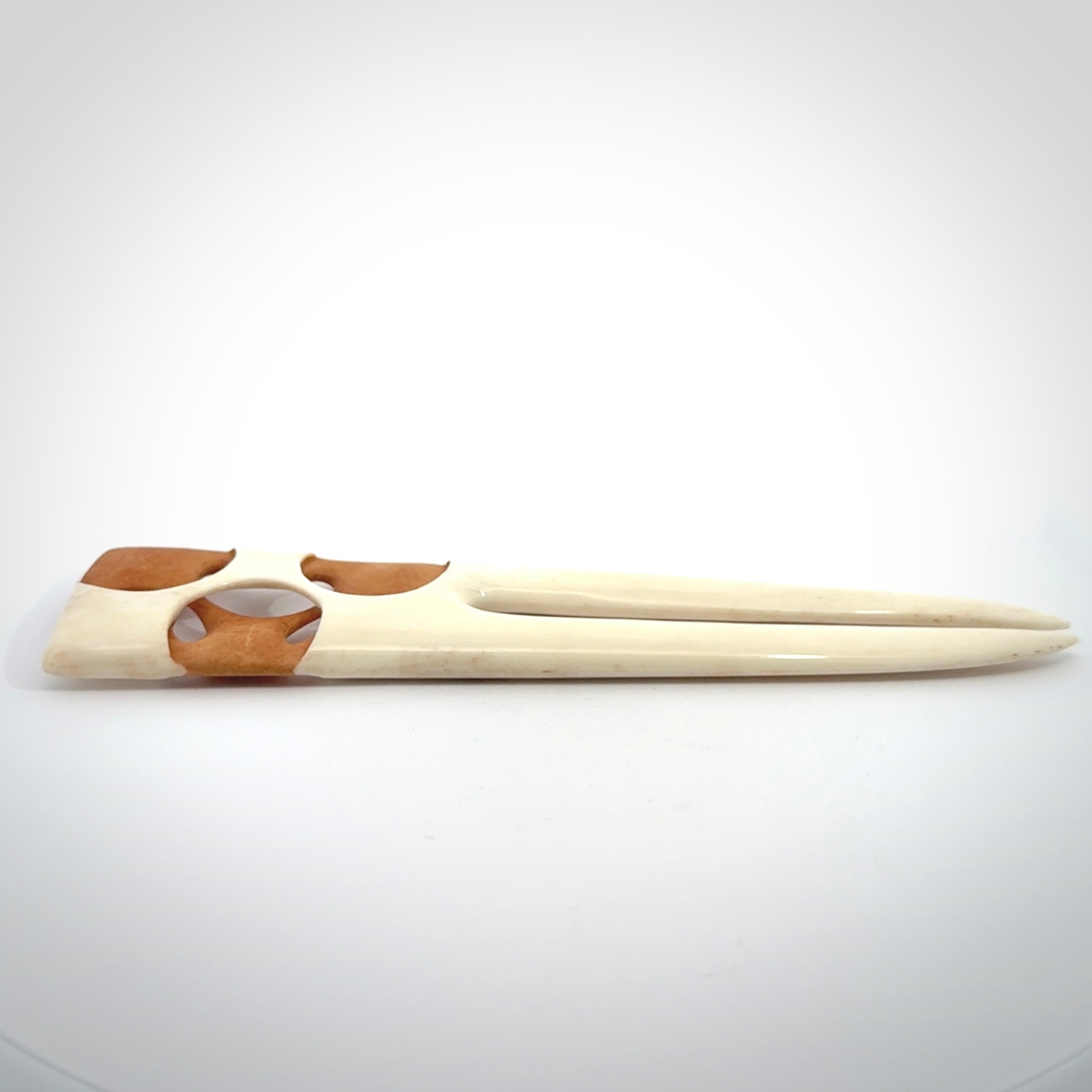 Hand carved bone heru comb