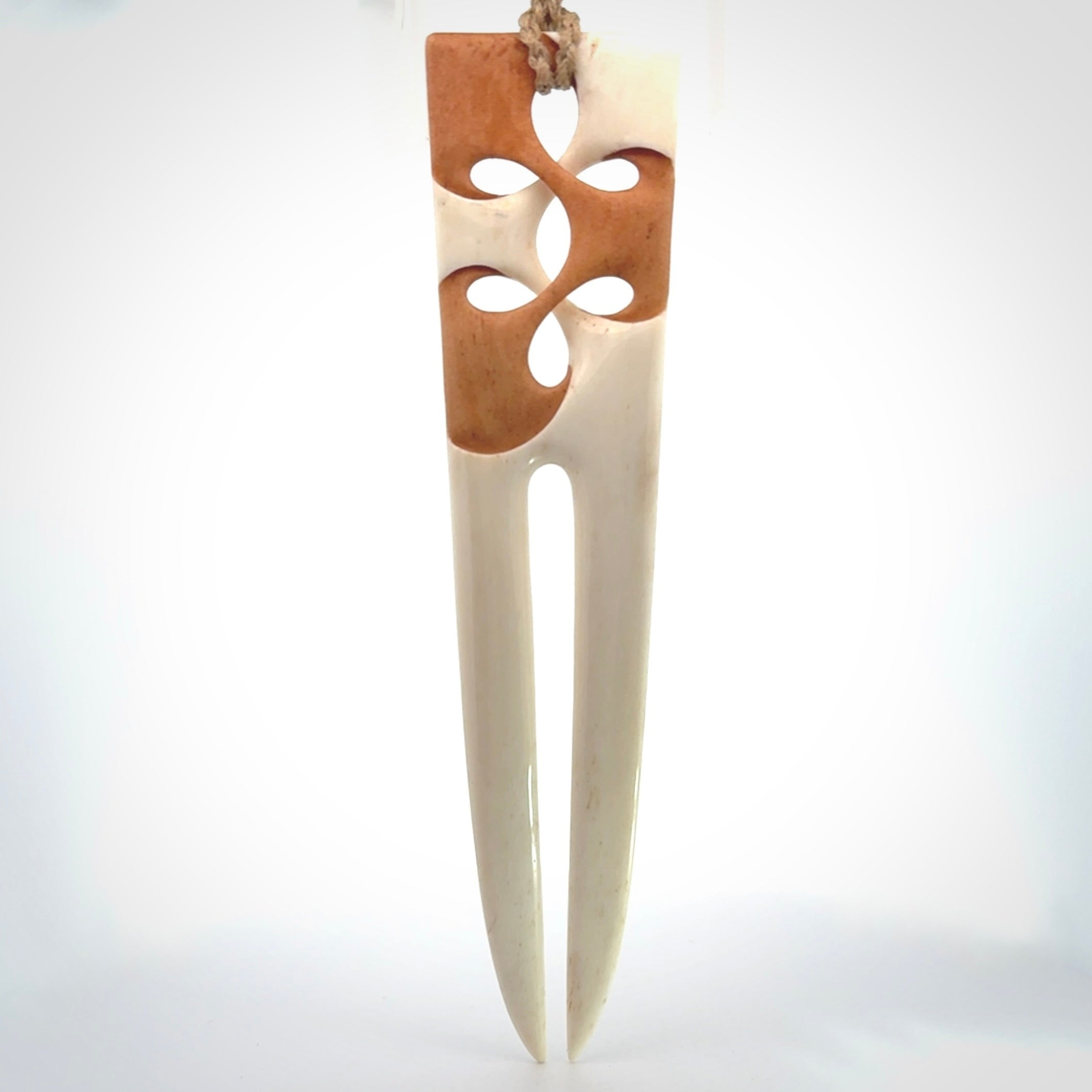 Hand carved bone heru comb
