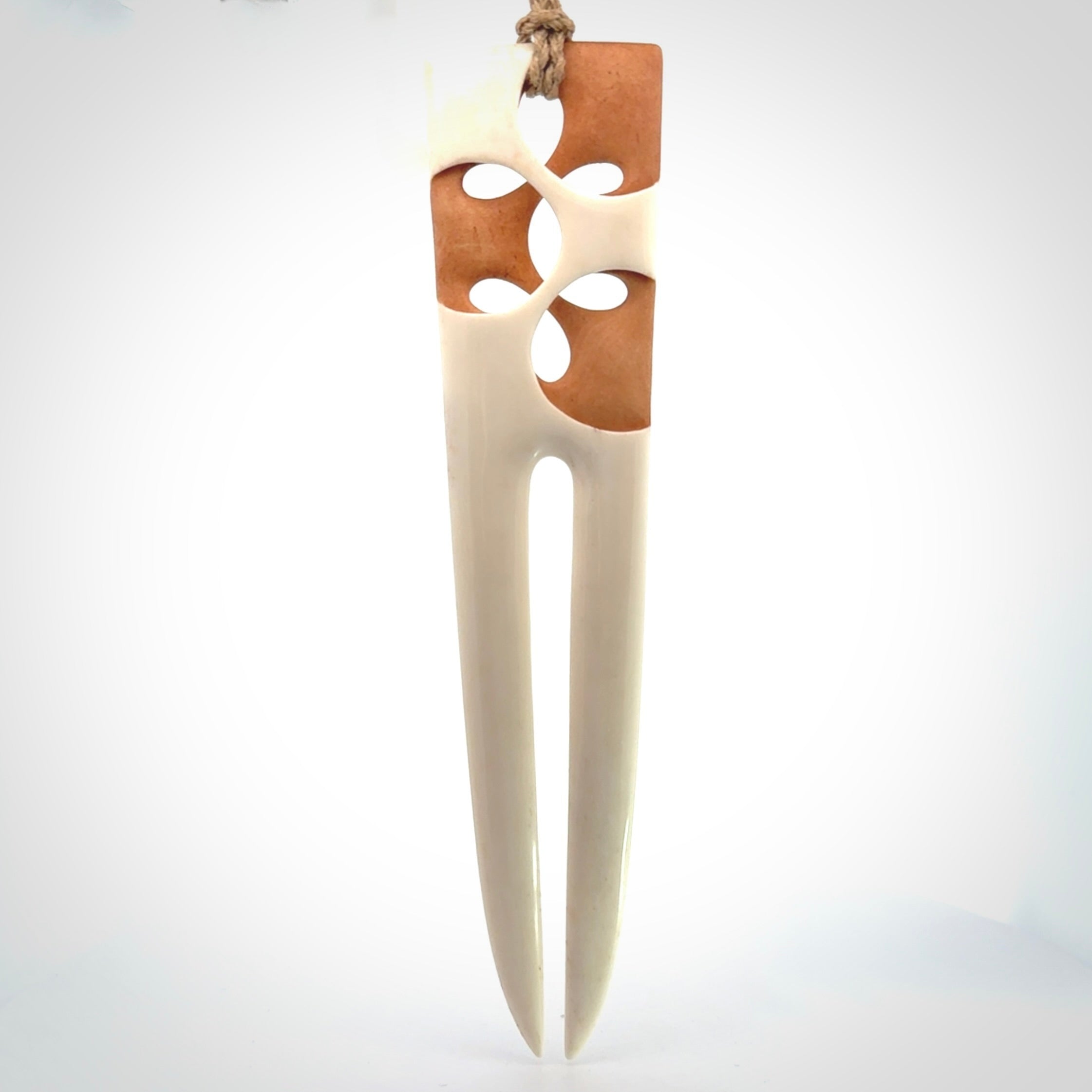 Hand carved bone heru comb