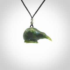 Hand carved Jade kiwi pendant for lovers of birds. Hand made kiwi necklace with black adjustable cord. Unique gifts and Art to Wear by NZ Pacific.