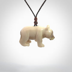 This picture shows a pendant that we designed in Deer Antler. It is a little Panda bear that has a walking stance and is carved in detail. A really attractive and eye-catching piece of handmade jewellery. The cord is hand plaited braid and the length can be adjusted.