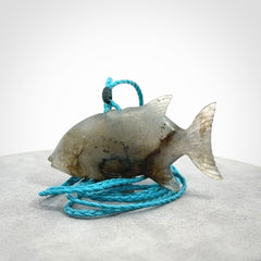 Hand carved Labradorite Trevally fish pendants.