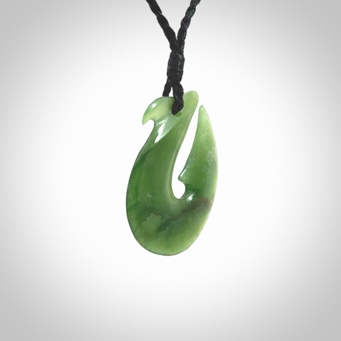 Hand carved New Zealand Jade Hook Pendant. Hand made Jade Hook, matau necklace provided with adjustable cord.