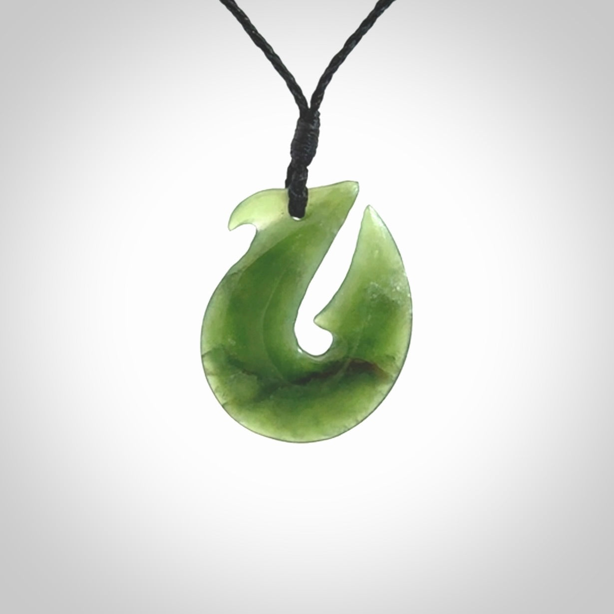 Hand carved New Zealand Jade Hook Pendant. Hand made Jade Hook, matau necklace provided with adjustable cord.