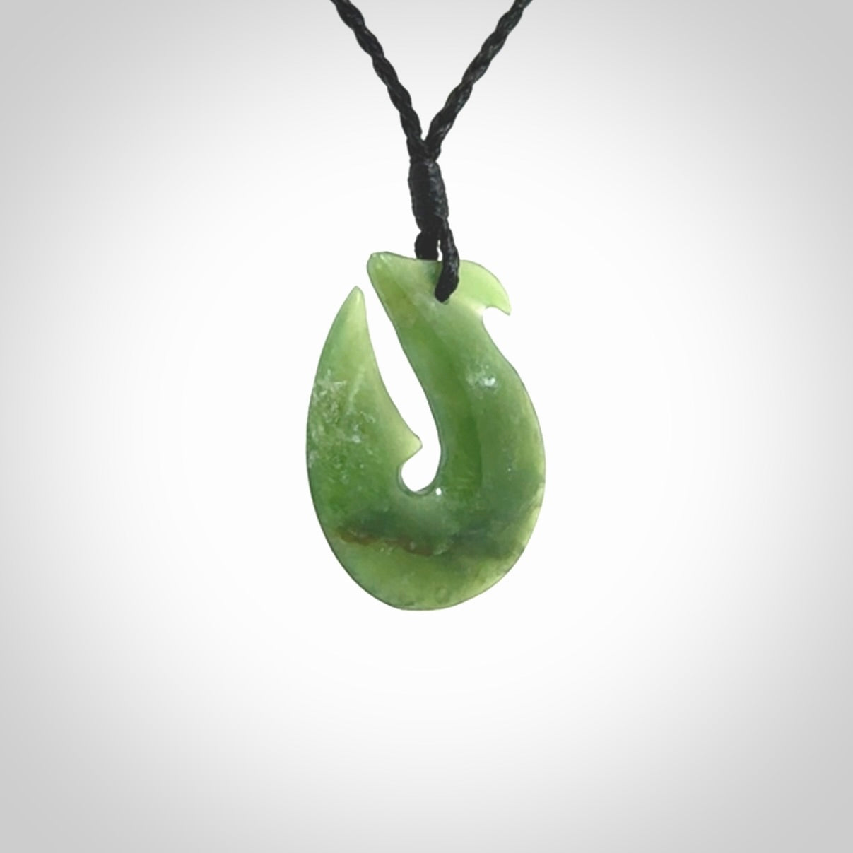 Hand carved New Zealand Jade Hook Pendant. Hand made Jade Hook, matau necklace provided with adjustable cord.