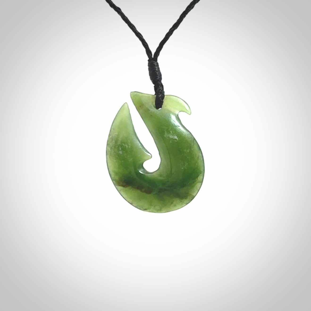 Hand carved New Zealand Jade Hook Pendant. Hand made Jade Hook, matau necklace provided with adjustable cord.