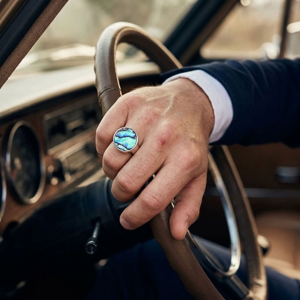 Man wearing paua and silver ring