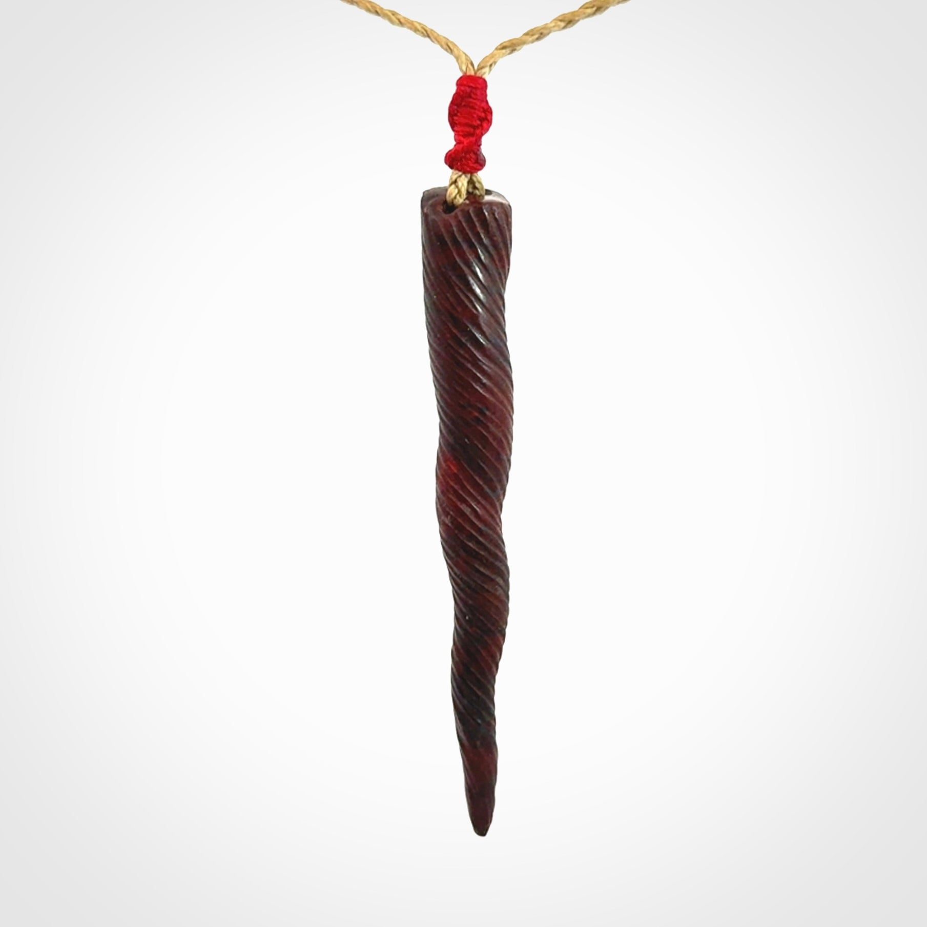 A Unicorn Horn pendant Carved in Jasper