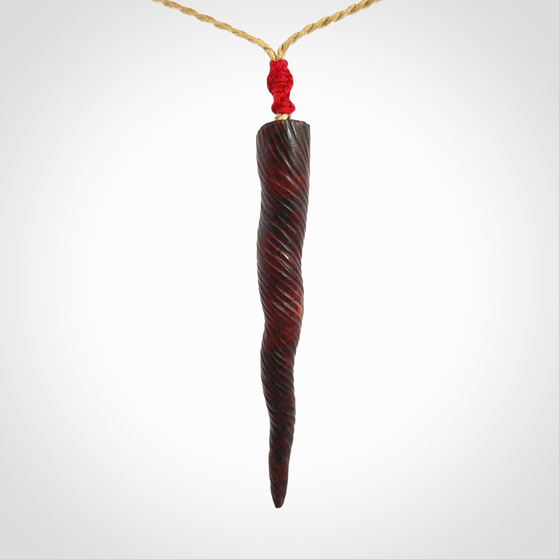 A Unicorn Horn pendant Carved in Jasper