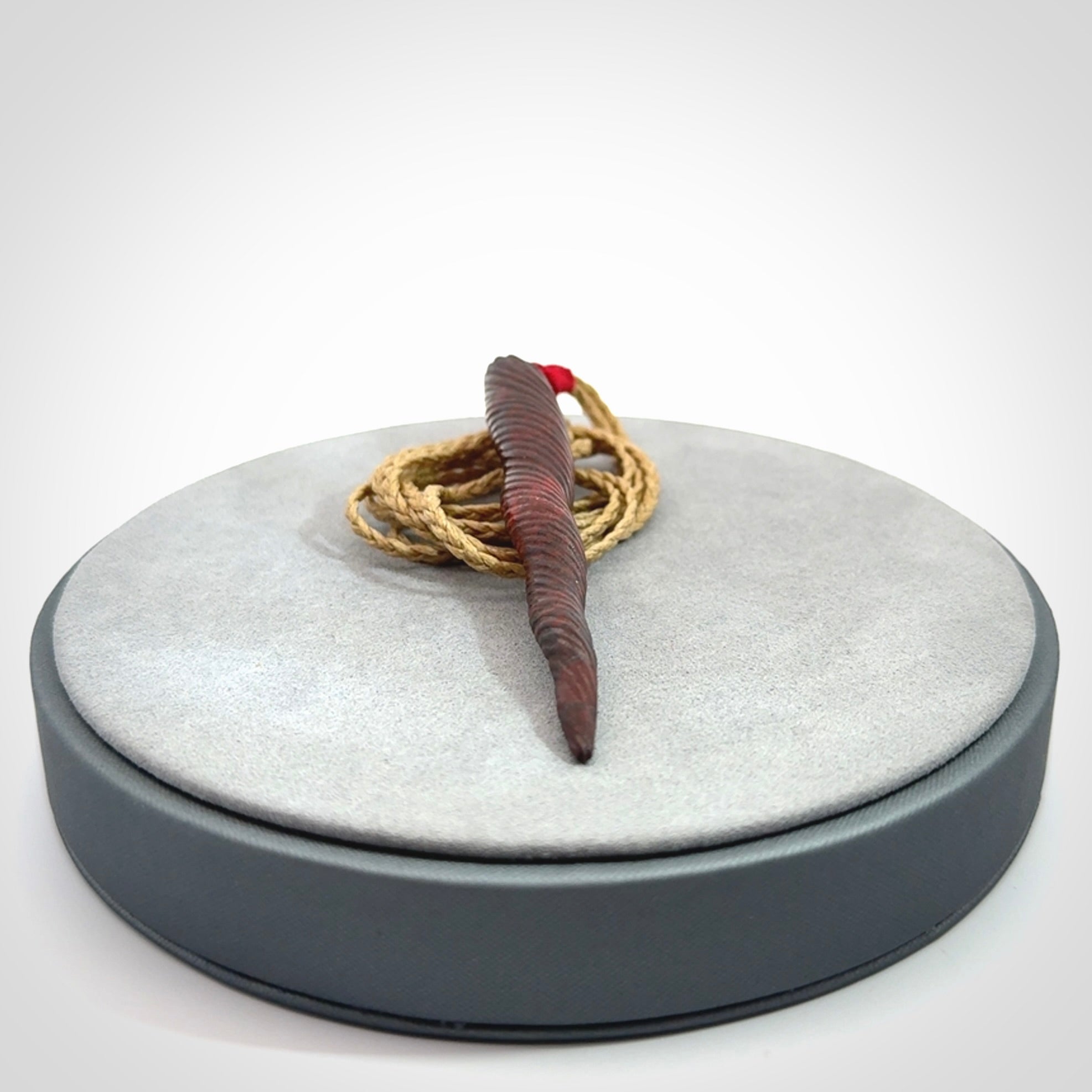 A Unicorn Horn pendant Carved in Jasper