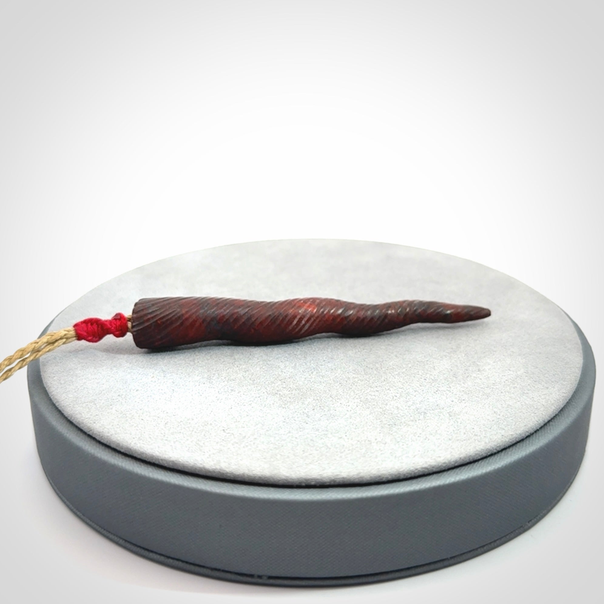 A Unicorn Horn pendant Carved in Jasper