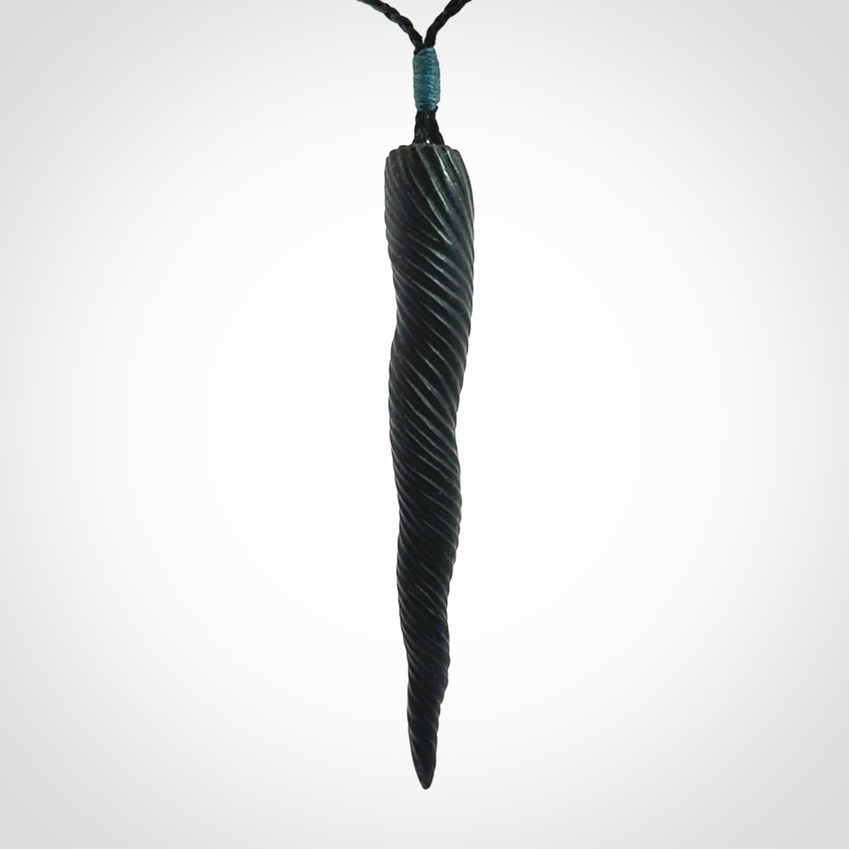 A Wonderful Unicorn Horn Pendant, Carved in Black Jade