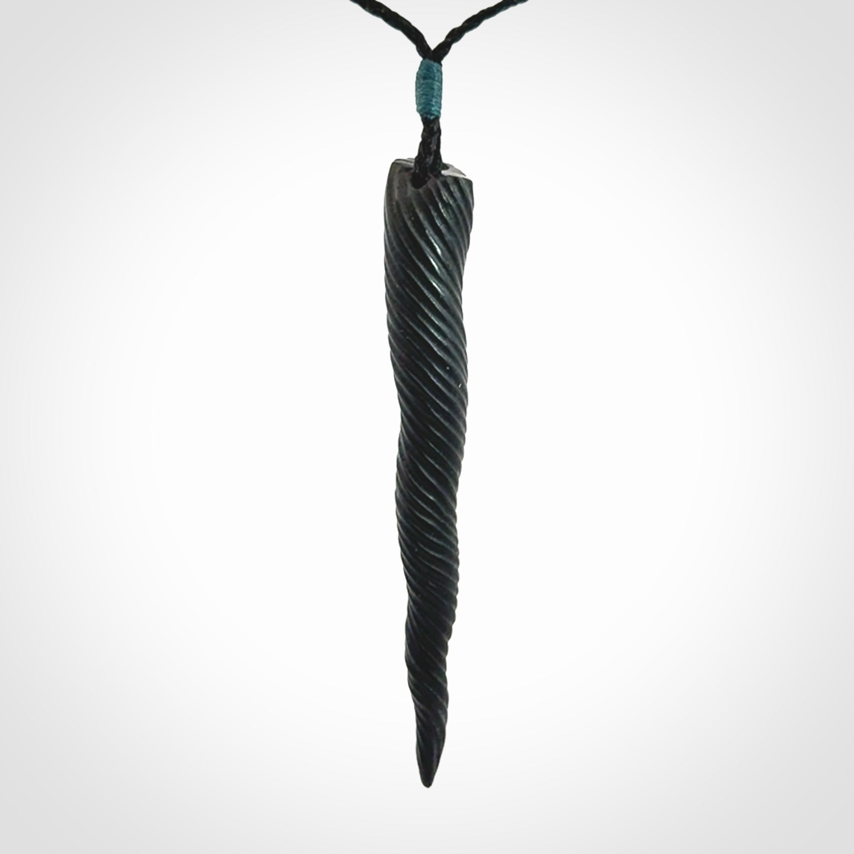 A Wonderful Unicorn Horn Pendant, Carved in Black Jade