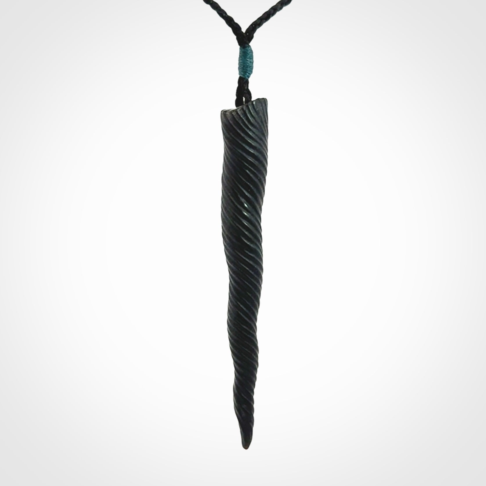 A Wonderful Unicorn Horn Pendant, Carved in Black Jade