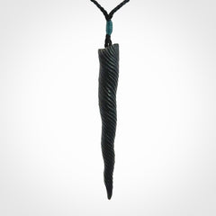 A Wonderful Unicorn Horn Pendant, Carved in Black Jade