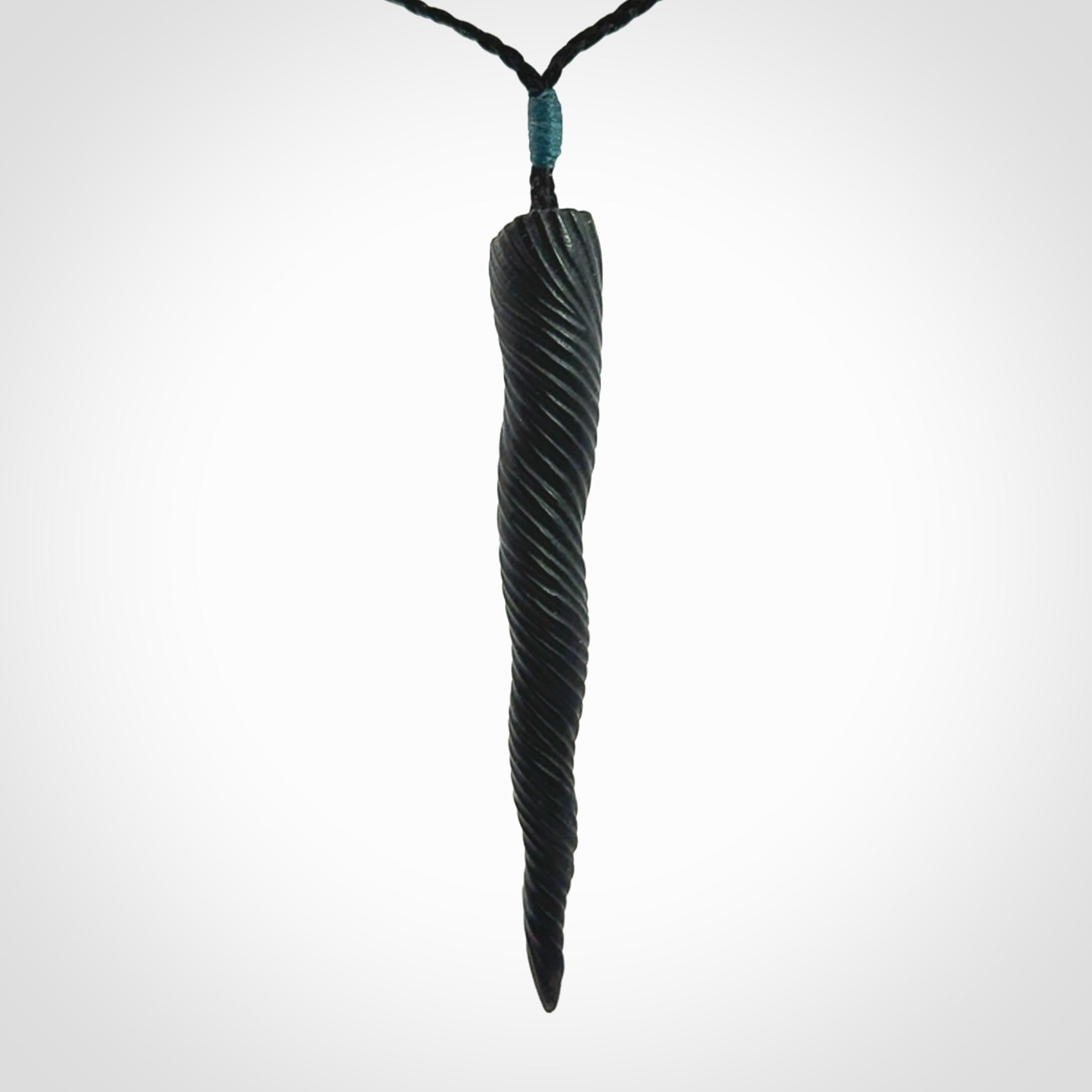 A Wonderful Unicorn Horn Pendant, Carved in Black Jade