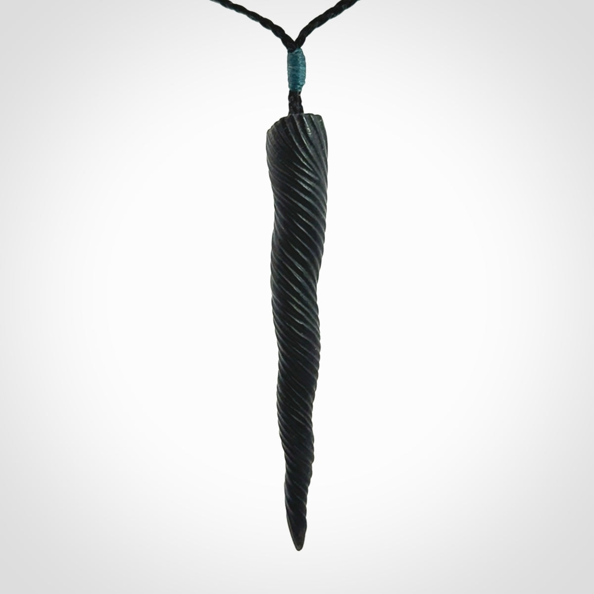 A Wonderful Unicorn Horn Pendant, Carved in Black Jade