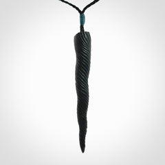 A Wonderful Unicorn Horn Pendant, Carved in Black Jade