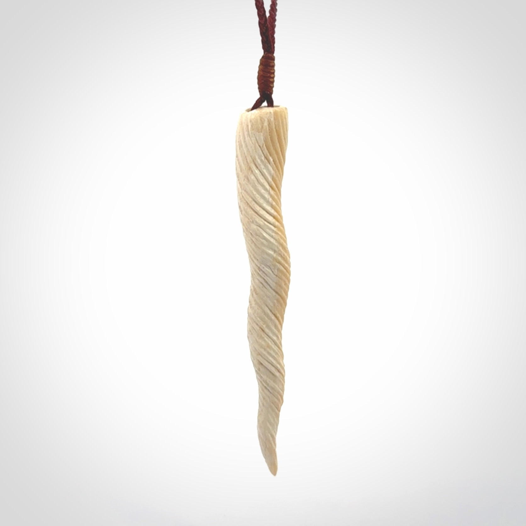 Hand carved woolly mammoth tusk unicorn horn pendant