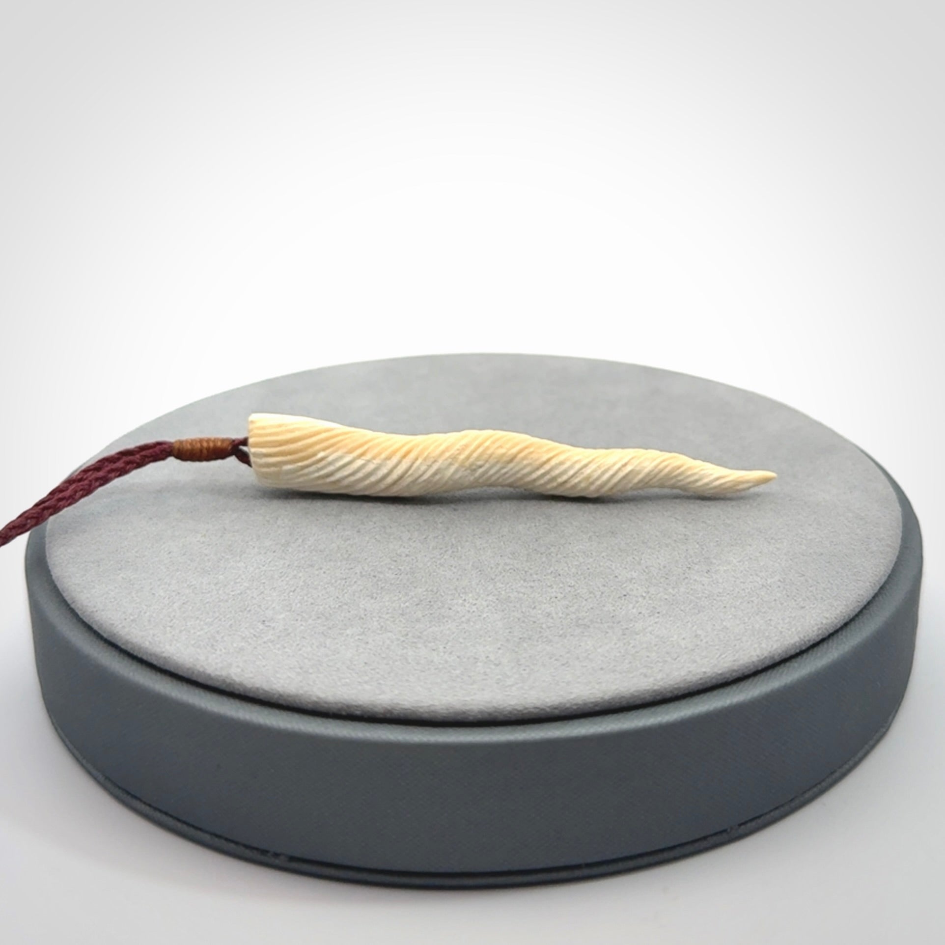 Hand carved woolly mammoth tusk unicorn horn pendant
