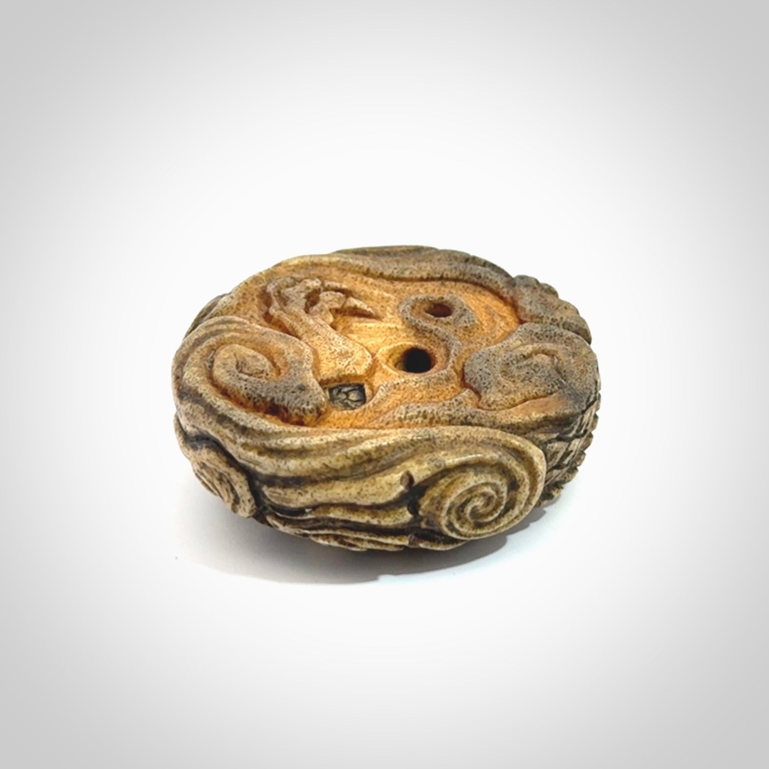 Hand carved red eyed dragon in the clouds made from Deer antler Crown with Mother of Pearl and Gold Leaf. Hand made by master bone carver Fumio Noguchi. Spectacular collectable work of art to display. One only, delivered to you at no extra cost with express courier.