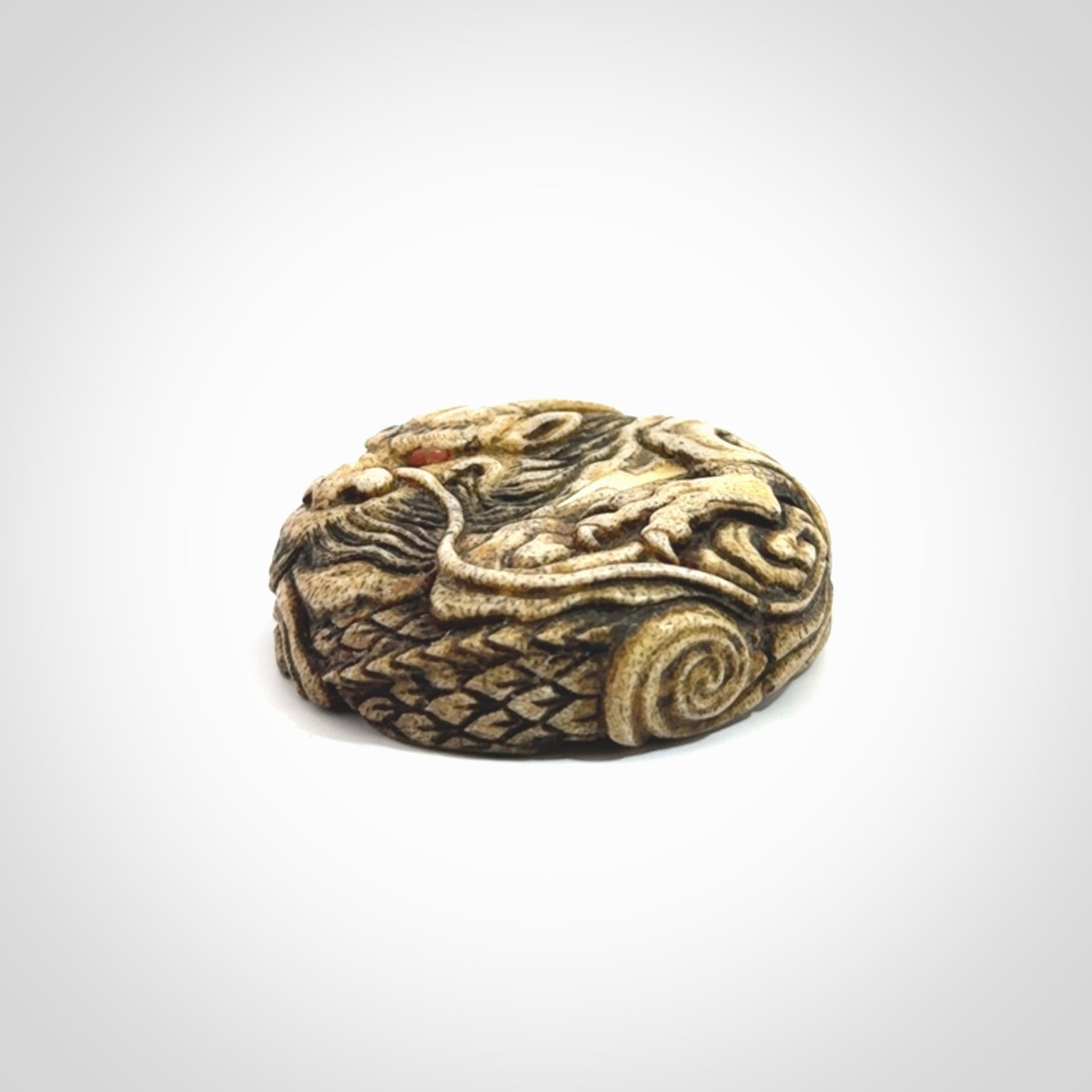 Hand carved red eyed dragon in the clouds made from Deer antler Crown with Mother of Pearl and Gold Leaf. Hand made by master bone carver Fumio Noguchi. Spectacular collectable work of art to display. One only, delivered to you at no extra cost with express courier.