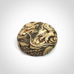 Hand carved red eyed dragon in the clouds made from Deer antler Crown with Mother of Pearl and Gold Leaf. Hand made by master bone carver Fumio Noguchi. Spectacular collectable work of art to display. One only, delivered to you at no extra cost with express courier.