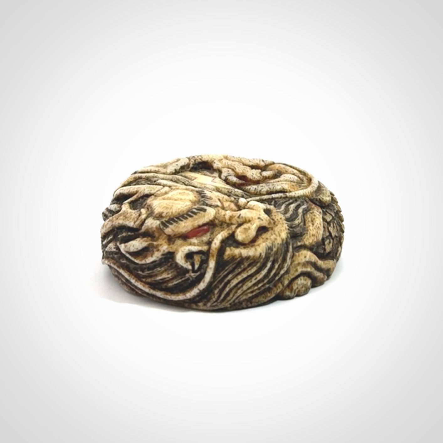 Hand carved red eyed dragon in the clouds made from Deer antler Crown with Mother of Pearl and Gold Leaf. Hand made by master bone carver Fumio Noguchi. Spectacular collectable work of art to display. One only, delivered to you at no extra cost with express courier.